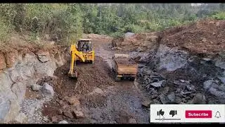 jcb loading stone (gravel) in a dump truck