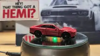 (Music) Matchbox showcase No. 10, 2024 Dodge Charger EV in both colors.