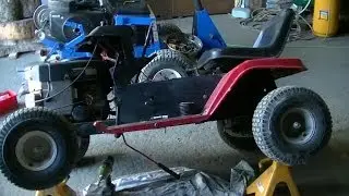JunkStarBuilds Working on Lifted Mower