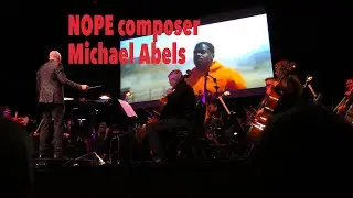 Nope music composer Michael Abels conducts Orchestra and interview. Los Angeles CA November 10, 2022