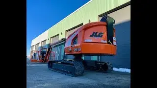 Aper&ccedil;u: transport securitaire de  nacelle sur chenille JLG 460SJC