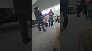Belligerent passenger denied boarding, boyfriend leaves her behind. (2)