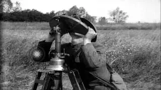 US soldiers look through antiaircraft tracking devices and man antiaircraft guns ...HD Stock Footage
