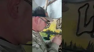 AIRBRUSHING A CARVED SIGN #carvings #airbrushing #carvingsbylawrence #chainsawcarving