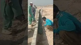 Pouring of concrete for Kerb stone hanching