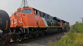 Freshly Repainted ES44DC GEVO Trails Behind An EMD SD70M-2 With Odd K5LA Horn, CN 598