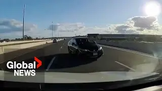 Terrifying moment wrong-way driver narrowly avoids incoming traffic on 401 highway