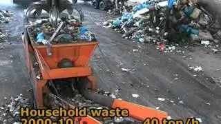 Stationary M&J EtaPreShred 2000 waste shredder in action - shredding household waste