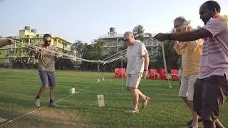 Corporate fun game: lift a block from one end and build a tower on other end with thread balance🤣