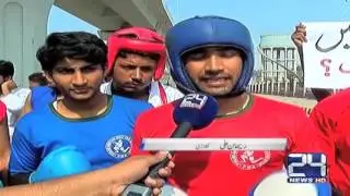 24 Report:  Karate students protest against Metro project Multan