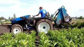 Spitten met een New Holland TCE44