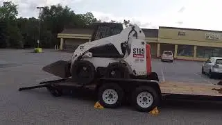 LOADING SKID STEER TIPS HORNUNG