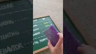 Removing old chalk markers from chalkboard.