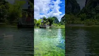 Serene Mountain Lake: A Musical Journey by Boat #BoatRide #MountainScenery #NatureBeauty