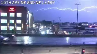 [Traffic Cam] Frequent lightning and street flooding during rare Seattle storm