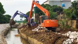 New residential project, Komatsu excavators scooping sand and gravel, wheel loaders.