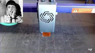 Engraving Angelina Jolie from Hackers on red cedar wood with a 10w diode laser