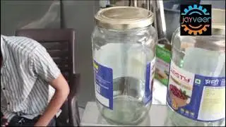 Round bottle labelling machine