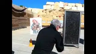 Col. Sharon Gat demonstrates selective fire shooting in a civilian environment