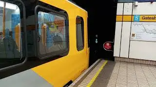 Tyne and wear metro Class 555 departs Gateshead