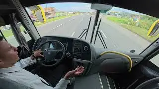 Dirigindo o ônibus da Scania de marcha programada.
