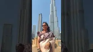 A gracful lady celebrates Amidst the dazzling streets of Dubai-where culture meets modernity.