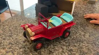 VINTAGE, TIN, B/O CAP-FIRING OLD FASHIONED CAR IN ORIGINAL BOX. FULLY ORIGINAL & COMPLETELY WORKING!