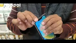 Wrapsol polyurethane protective sheet installation on iPhone 13 Pro.