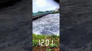Musi river flowing over the bridge near Musarambagh, Hyderabad.