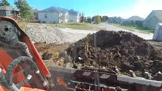 SVL75 Pushing Dirt Piles