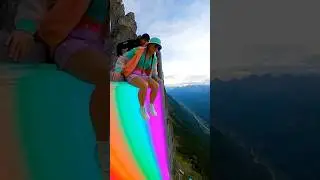 Glowy Cliff Slide is Fun 😱🔥 Girl Slides then Flies over Airbag! #cliffactivity #cliffslide