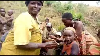 Batwa Children Enjoy Clean Water Well