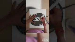 Stenciling my badminton racket with Lin Dan logo.
