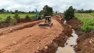 Professional Bulldozer in Action! Perfect Soil Spreading for Road Foundation Work.