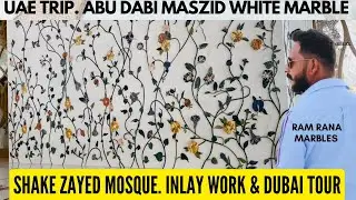 Marble inlay work flooring design in ashwke Zayed mosque UAE. white marble inlay work flooring desig
