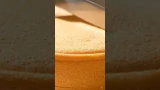mouth watering cinematic shot of an ultra soft sponge cake on a white plate #cake #baking
