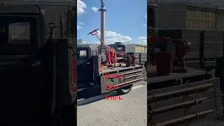 A retro fire truck participated in a military parade on Palace Square in St. Petersburg