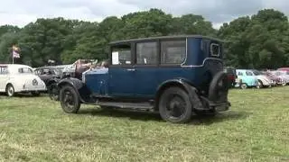 PARADE OF OLD CARS AT THE JULY 2011 NETLEY MARSH STEAM AND CRAFT SHOW.