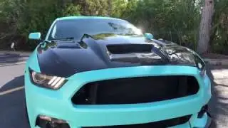 Bagged S550 Mustang wrapped in 3M Satin Key West