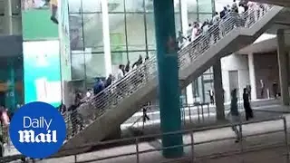 Shocking moment fans storm barriers to access Wembley stadium