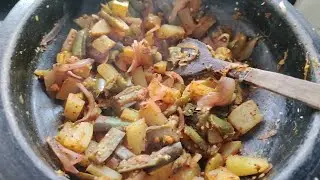 Simple oilfree Brinjal potato onion curry made in a clay pot