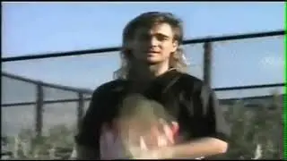 Young Andre Agassi Hitting Against The Wall