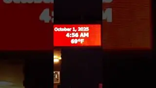 Citizens Bank New Ulm Minnesota electric sign flashing early in the morning