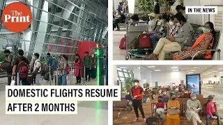 Passengers arrive at IGI airport as domestic flight operations resume after 2 months of suspension
