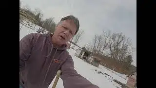 Loading hog on crutches with snow and ice