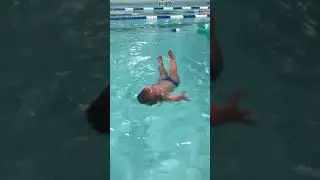 baby swim lessons thrown in pool #shorts 3