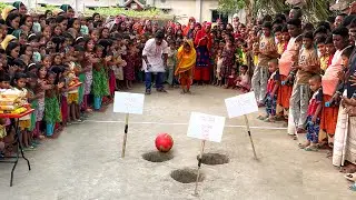 গর্তের মধ্যে বল গড়িয়ে চাল, ডাল, তেল জেতার চ্যালেঞ্জ। নতুন গ্রামের আপারা চমক দেখিয়ে বড় পুরস্কার জিতলো