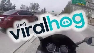Merging Car Sends Motorcycle Into Tiny Gap || ViralHog