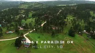 Escape to the Black Hills of South Dakota in this Charming Log Cabin