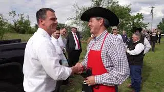 Governor Stitt holds cookout under PETA meathead billboard